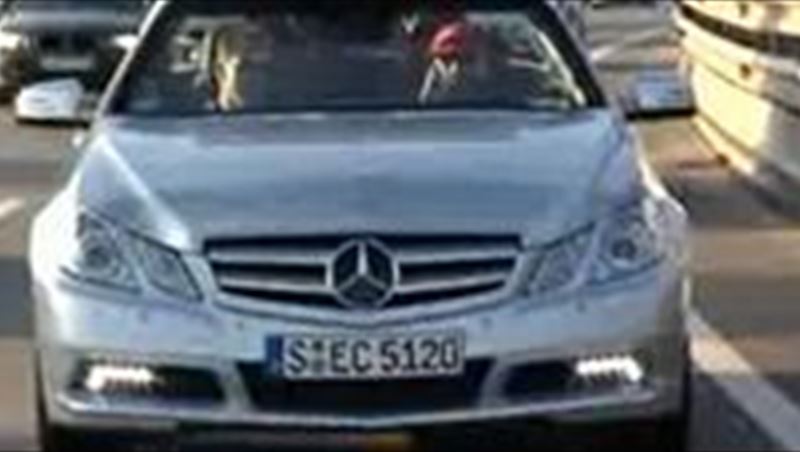 Niki Lauda questioning Michael Schumacher in Mercedes E Class Cabrio